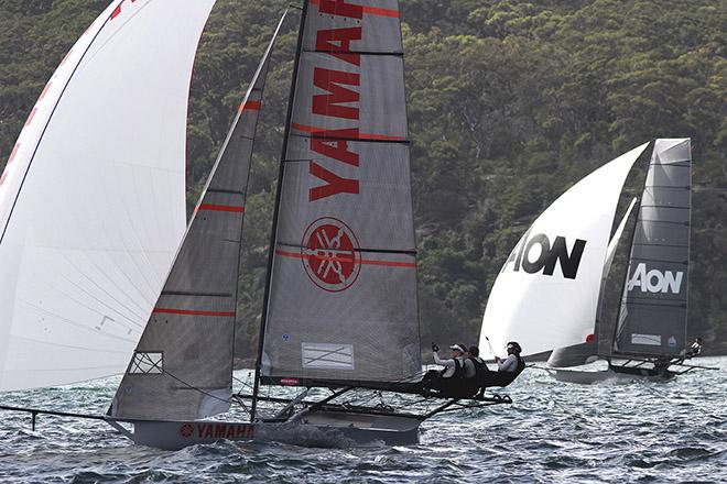 NZ pair Yamaha and AON lead the fleet down the first spinnaker run © Frank Quealey